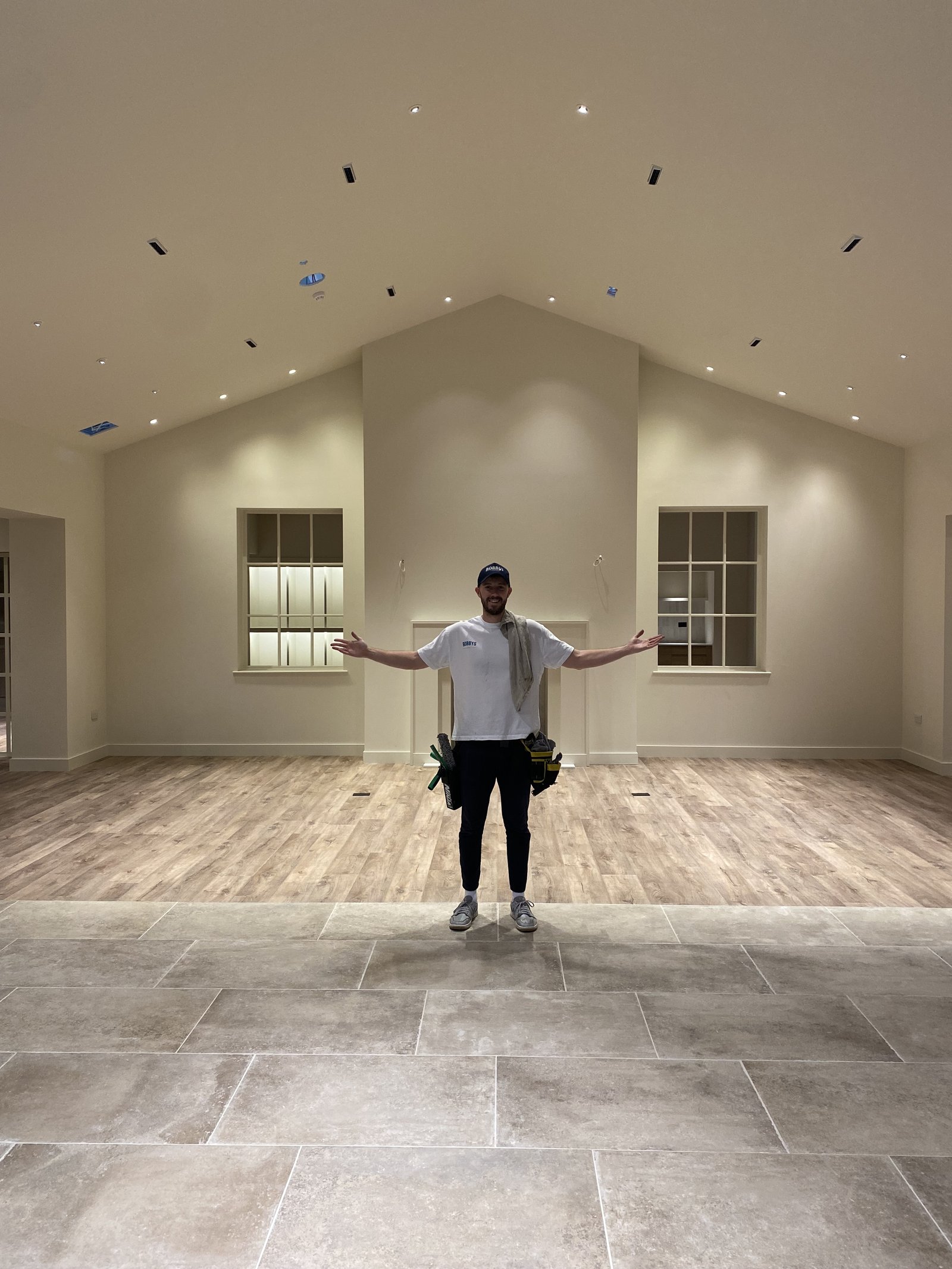 Jack inside a finished new-build home after a post-construction window clean